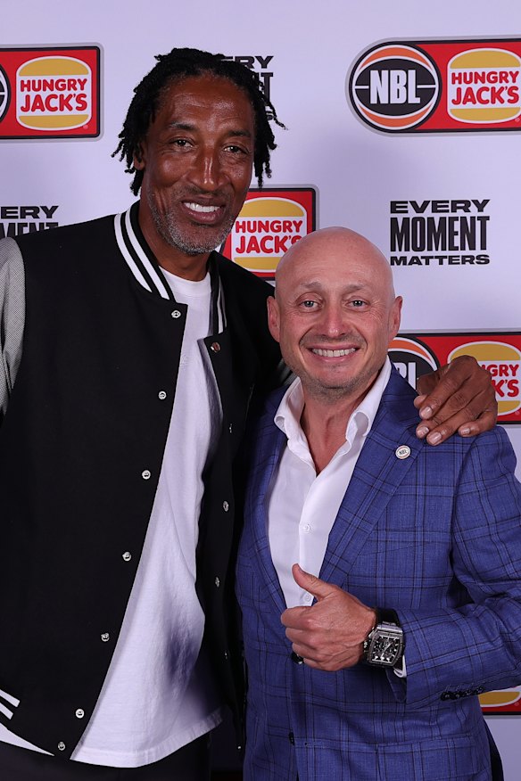 Billionaire businessman Larry Kestelman (right), who will now run the WNBL, pictured with NBA great Scottie Pippen.