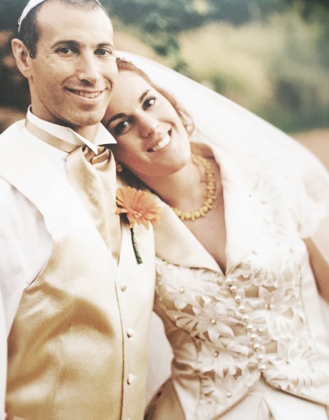 Jo and Jeremy Saunders on their wedding day. Jo converted to Orthodox Judaism to be with him.