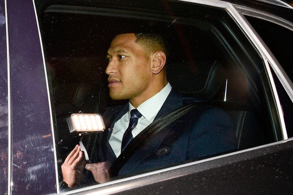 In the balance: Israel Folau leaves a Rugby Australia code of conduct hearing in Sydney.