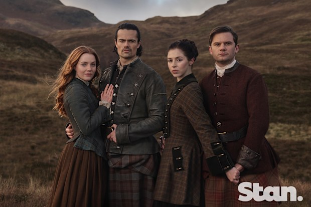 Outlander: Blood Of My Blood season 2 promotional image. Harriet Slater as Ellen MacKenzie. Jamie Roy as Brian Fraser. Hermione Corfield as Julia Beauchamp. Jeremy Irvine as Henry Beauchamp.