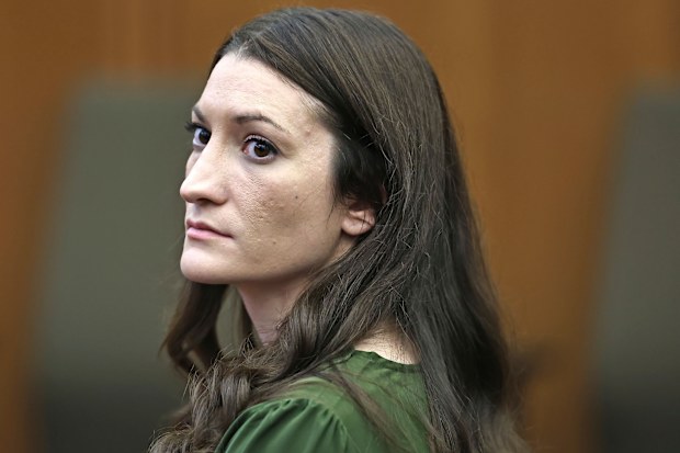 Lindsay Clancy watches jury members as Judge William Sullivan polls them before they start deliberations during her murder trial at Plymouth Superior Court 