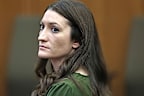 Lindsay Clancy watches jury members as Judge William Sullivan polls them before they start deliberations during her murder trial at Plymouth Superior Court 