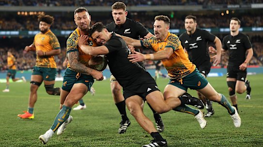 Quade Cooper goes in for a tackle.