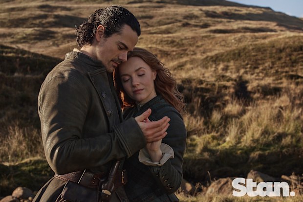 Outlander: Blood Of My Blood season 2 promotional image. Jamie Roy as Brian Fraser. Harriet Slater as Ellen MacKenzie.