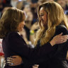 Musical artist Beyonce, right, and Democratic presidential nominee Vice President Kamala Harris, left, embrace on stage during a campaign rally Friday, Oct. 25, 2024, in Houston.
