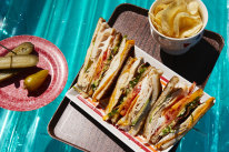 Garlic-buttered bread sends the flavour of this club sandwich soaring.