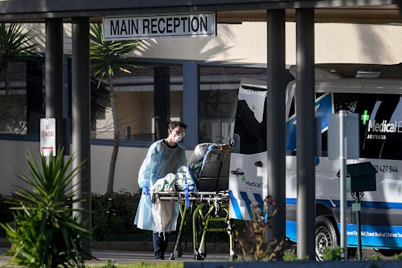 Residents are removed from St Basil's Home for the Aged, the site of Australia's deadliest COVID-19 outbreak.