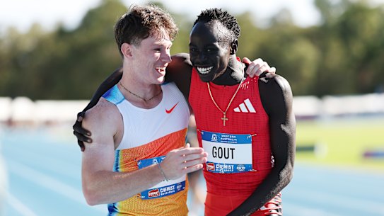 Rivals and friends: Lachie Kennedy and Gout Gout embrace.