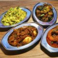 Dishes of egg, cabbage, prawns with okra, and dry pork at Toddy Shop.