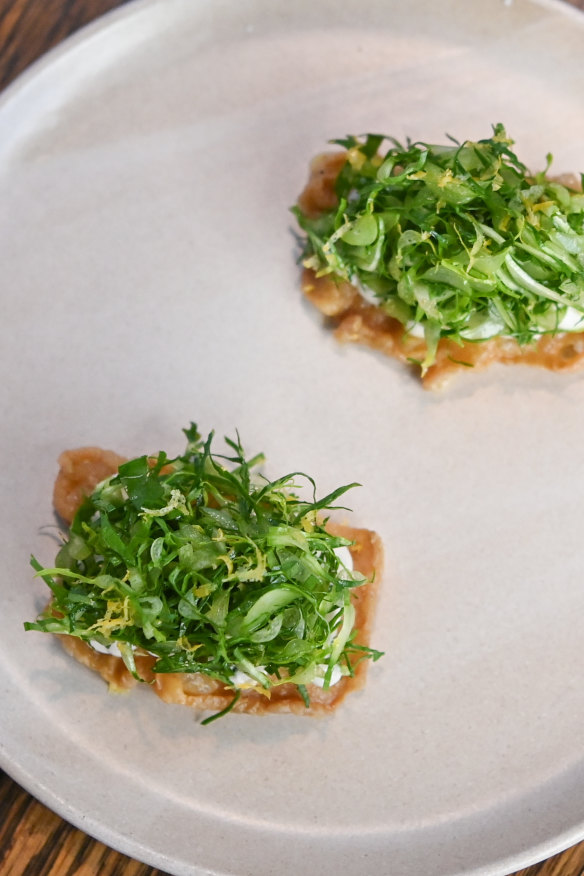 Chicken skin crisps with whipped anchovy.