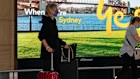 Passengers arrive early morning at Sydney Airport, Monday, Nov. 29, 2021. Authorities in Australia said Sunday, Nov. 28, 2021, that two travelers who arrived in Sydney from Africa became the first in the country to test positive for the new variant of the coronavirus, omicron. (AP Photo/Mark Baker)