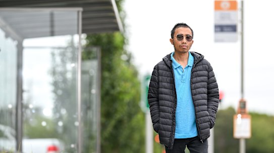 Monash University graduate student Irvan Adistha Putra at a bust stop on Friday.
