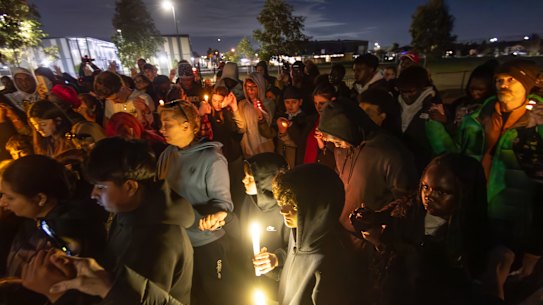 A candlelight vigil for Chol Achiek and Dau Akueng, who were stabbed to death in Cobblebank.