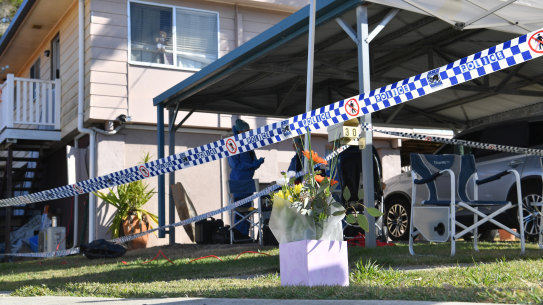 Flowers left at the scene on Monday.
