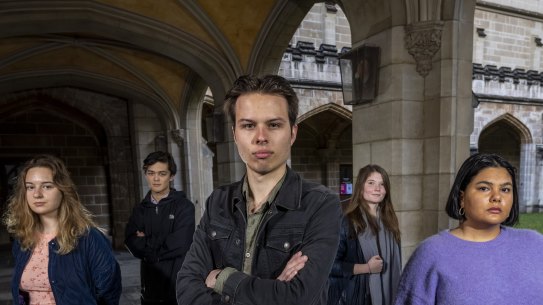 Melbourne University student union president Jack Buksh (centre) says a $7m federal grant would be better spent on staff or subjects.