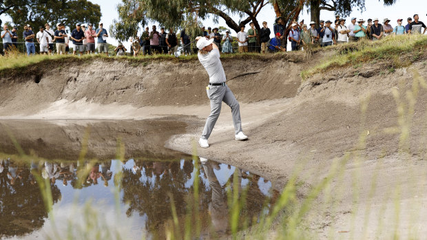 Cameron Smith plays a shot from the bunker at the first hole at Victoria Golf Club during the first round of the Australian Open.