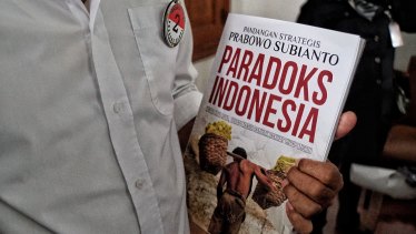 A Prabowo supporter carried his latest book 'Paradox Indonesia'.