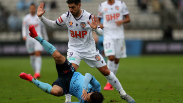Perth Glory's Bruno Fornaroli stands over Sydney FC's Kosta Barbarouses in their clash at Netstrata Jubilee Stadium on March 14 - one of the final matches of the A-League before COVID-19 forced it into recess.