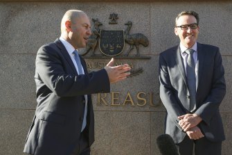 Treasurer Josh Frydenberg, pictured with Treasury secretary Steven Kennedy, will hand down the federal budget on Tuesday.