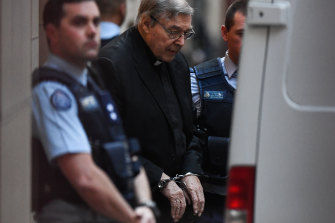 Cardinal George Pell leaves court on Thursday after his two-day appeal hearing.