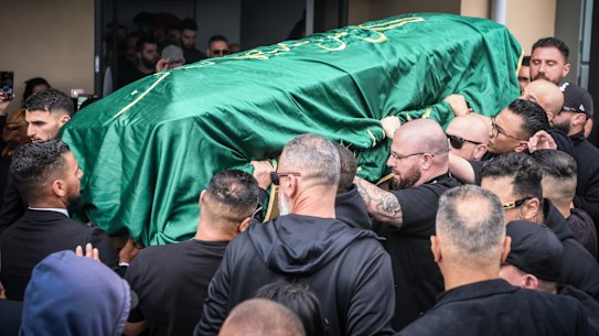 Mourners carry the casket of slain underworld figure Sam Abdulrahim at the Alawi Islamic Association in Epping on Thursday.