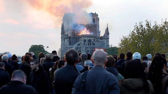 People broke out in song as flames engulfed Notre-Dame Cathedral.
