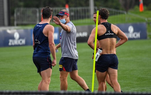 Goodwin gives a high five to a player at Casey Fields.