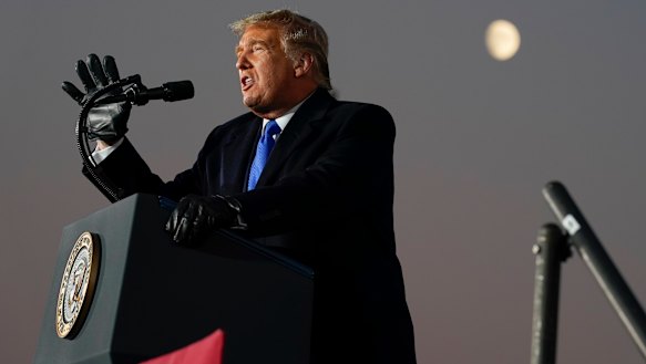 US President Donald Trump speaks during a campaign rally in West Salem, Wisconsin. 