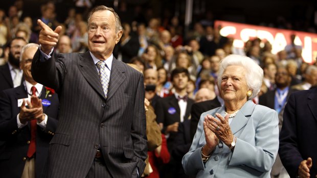 Former US President George HW Bush, left, and his wife Barbara, acknowledge the audience at the Republican National Convention in  2008. 