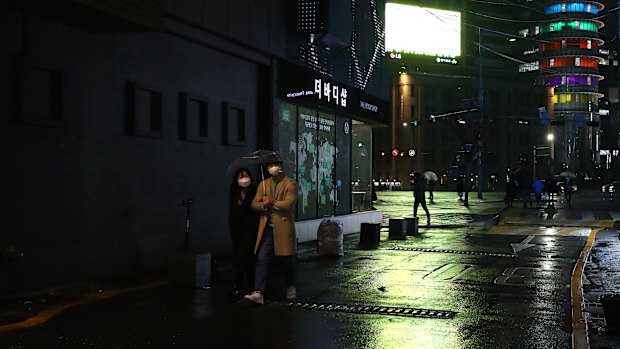 People wear masks to prevent the spread of coronavirus in Seoul, South Korea. 