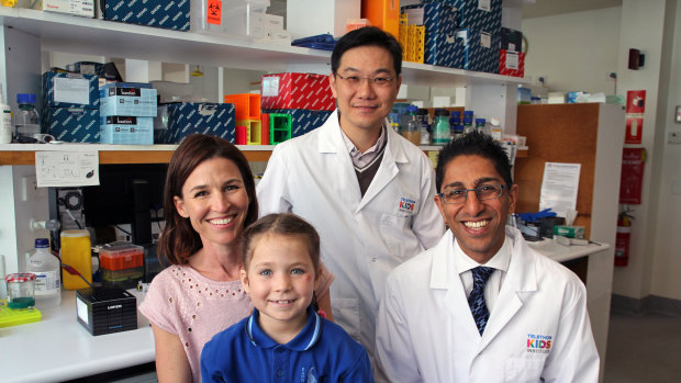 Marny Parker and daughter Flo, who was diagnosed with leukaemia at 3, with Telethon Kids Institute researchers Dr Laurence Cheung and Dr Rishi Kotecha.