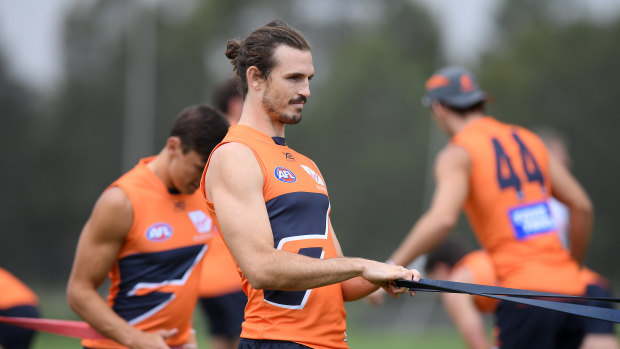 GWS Giants co-captain Phil Davis will line up on Paddy Ryder on Saturday night after Port Adelaide dumped spearhead Charlie Dixon to the SANFL.