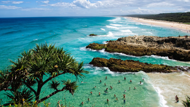 Looking south along the beach at Point Lookout on Stradbroke Island. North Stradbroke Island, just off Queensland's capital city of Brisbane, is the world's second largest sand island and, with its miles of sandy beaches.