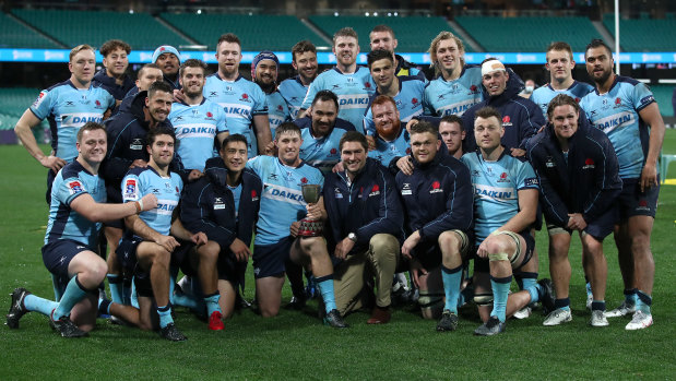 The Waratahs pose with the trophy during the round six Super Rugby AU match between the Waratahs and the Reds at Sydney Cricket Ground on August 08, 2020 in Sydney, Australia. 