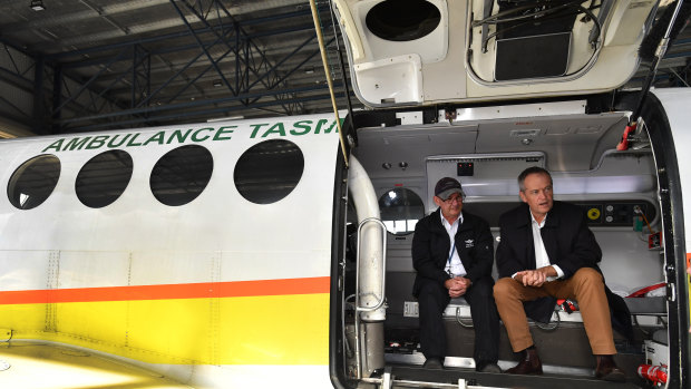 Bill Shorten aboard a Royal Flying Doctor Service plane in Launceston after announcing the organisation will receive $7 million if Labor is elected.  