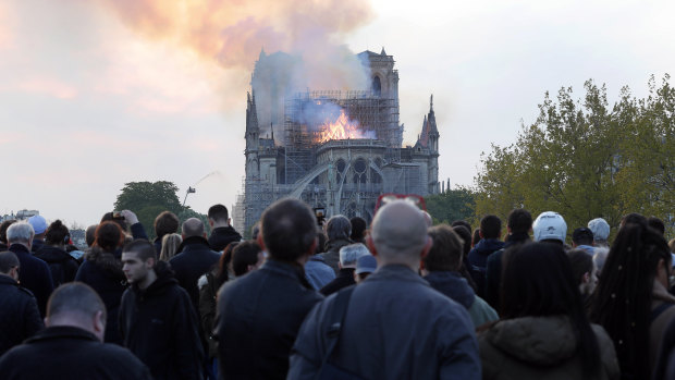 People broke out in song as flames engulfed Notre-Dame Cathedral.