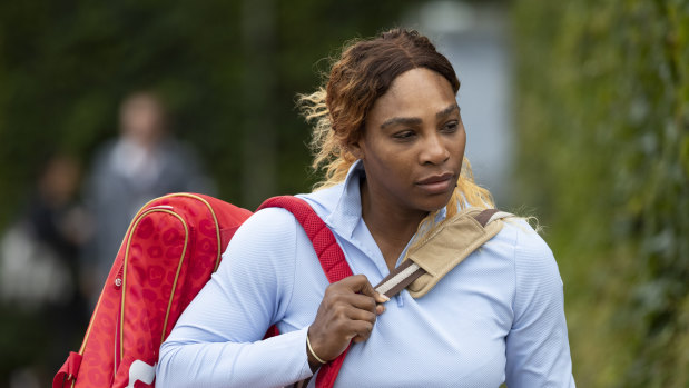 Serena Williams arrives for a practice session at the All England Club.