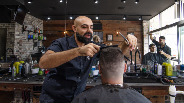 "The Duttmeister ... I just wish that he would keep his opinions to himself": Jeff Zoghbi, 29, at work at Barbercode.