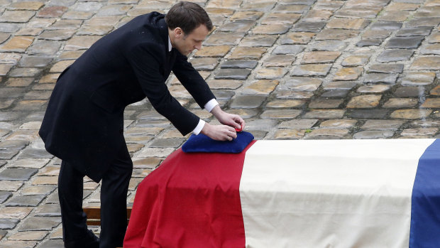 French President Emmanuel Macron posthumously awards the Legion of Honor to Lt. Col. Arnaud Beltrame.