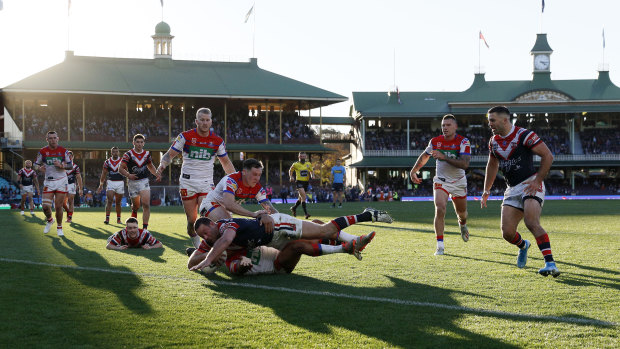 No place like home: Boyd Cordner scores against the Knights.