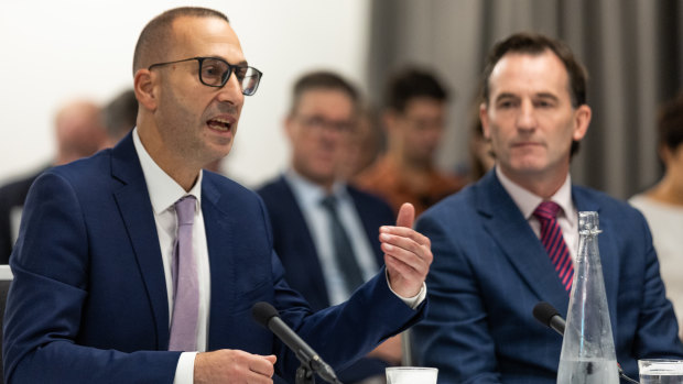 AFL chief medical officer Michael Makdissi and operations manager Andrew Dillon at the Senate inquiry. 