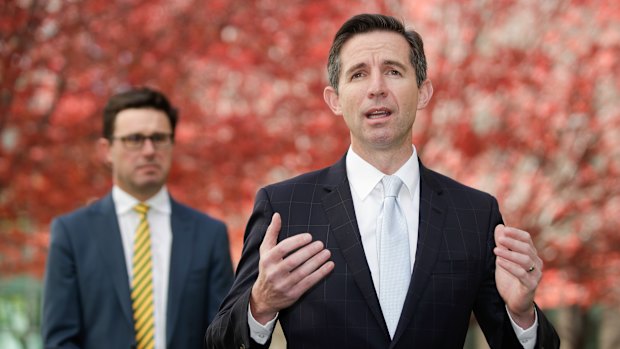 David Littleproud (back) and Simon Birmingham in Canberra this afternoon.