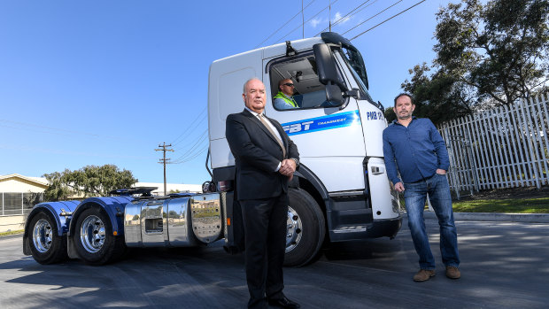 Victorian Transport Association chief executive Peter Anderson (left) and Maribyrnong Action Transport Group secretary Martin Wurt with a new truck equipped with a Euro 5 engine.