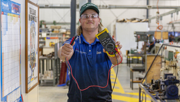 Dax Du Toit, an 18-year-old TAFE Queensland first-year electrical apprentice, is one of 4000 tradies eligible for $1000.