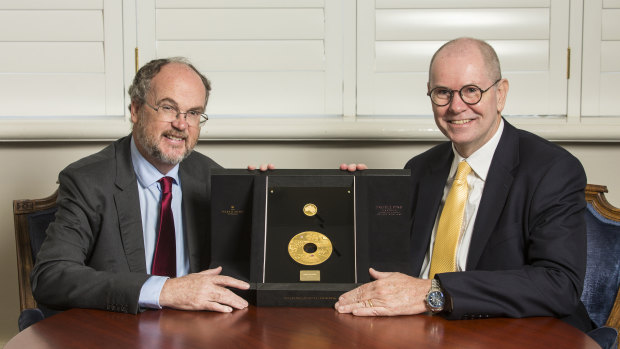 Minister for Mines and Petroleum Bill Johnston and The Perth Mint CEO Richard Hayes with the coin.