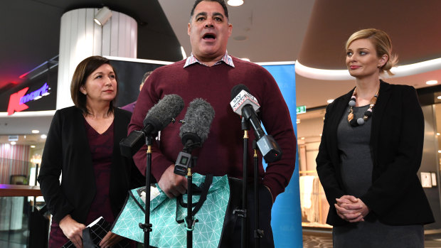 (L-R) Queensland Environment Minister Leeanne Enoch, rugby league legend Mal Meninga and the National Retail Association's (NRA) CEO Dominique Lamb explain Queensland's plastic bag ban which comes into place on July 1.
