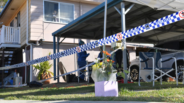 Flowers left at the scene on Monday.