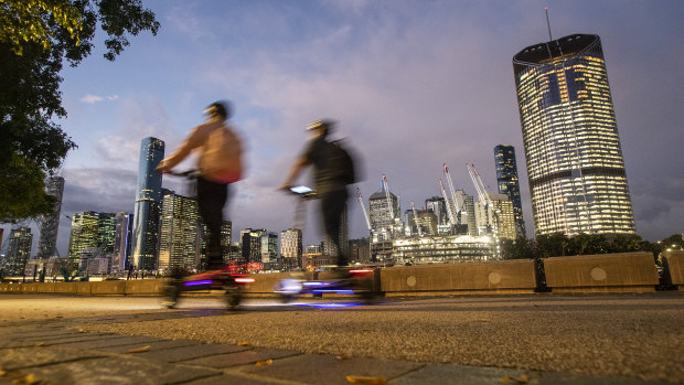 People ride scooters at South Bank during Brisbane’s third lockdown of 2021.