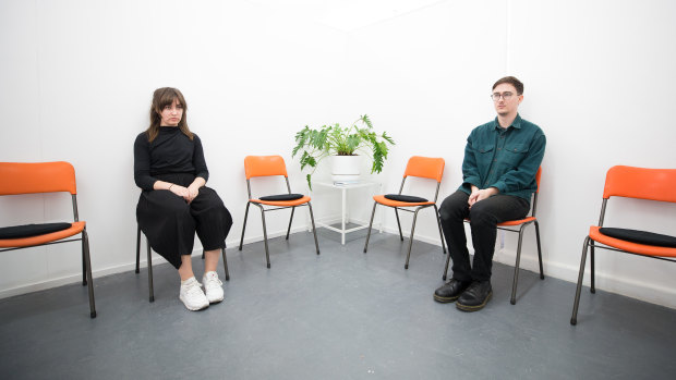 Artists Olivia Tartaglia and Alex Tate in the bureau waiting room.