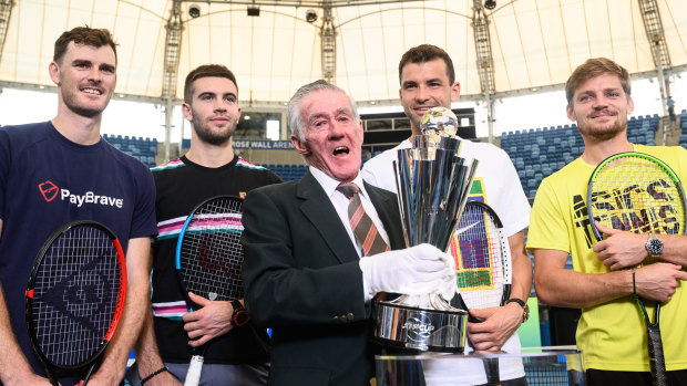 Jamie Murray of Great Britain, Borna Coric of Croatia, Ken Rosewall, Grigor Dimitrov of Bulgaria and David Goffin of Belgium in Sydney on Monday.